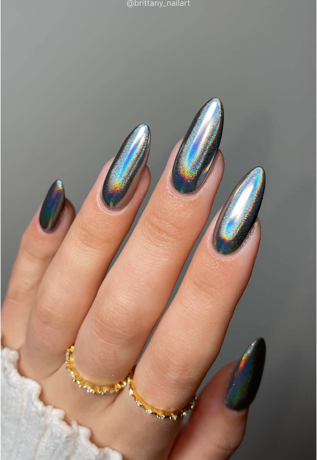✨🪩🌈 couldn’t stop looking at these chrome powder from amazn linked on my sf! rings from @Caitlyn Minimalist and @Bohomoon (gifted)- discount codes in bio 🫶🏼 ________ #chromenails #holo #holographic  #nails #nailart #nailtutorial #nailinspo #nailinspiration #nailideas #diynails #nailsathome #jewellery #cmpartner how to paint your nails at home • easy nail ideas • DIY nail art • at home gel nails • nail inspo • nail tutorial • Amazon finds • Black Friday • how to do chrome nails