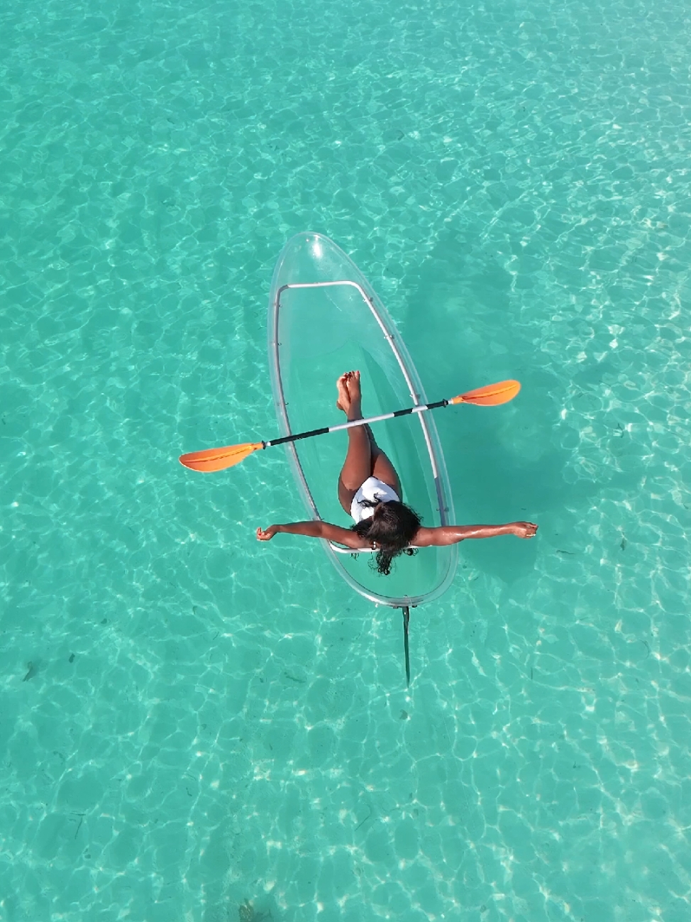 An epic Kayak Adventure. Paddle your way through the Indian Ocean while enjoying the views of the bottom of the sea from a fabulous transparent kayak. #zanzibar #maldives #tiktokkenya #southafrica #tiktoktanzania🇹🇿 #zanzibarbeach #africa #deepixelzanzibar #zanzibardestination 