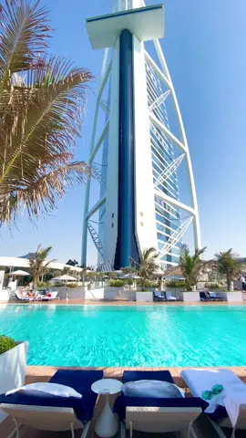 Pollside views at the most luxurious hotels in the world. #uae #views #fyp #dubai #burjalarab #traveltiktok 