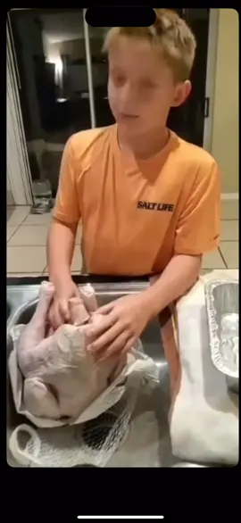 Boy helping mum out in the kitchen not sure if the turkey is a boy or girl until he pulls its neck out & confirms its a boy #fyp #foryou #foryourpage #fypage #trending #trend #viral #funny #humor #fpyシ #fypp #viral_video #fy 