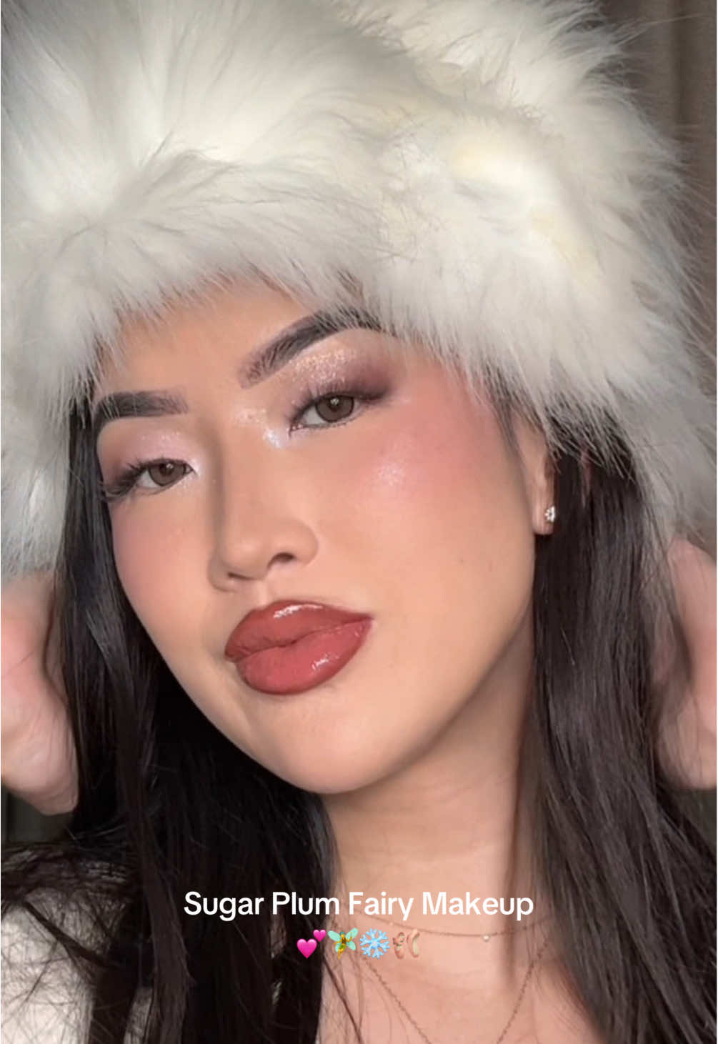 Sugar Plum Fairy makeup tutorial! ✨🩰 From sparkly eyes to radiant cheeks, let’s bring the holiday enchantment to life🧚‍♂️💕 Products  @Charlotte Tilbury flawless filter (fair) @TIRTIR Inc. cushion foundation (21N ivory) @Tower 28 Beauty concealer (dtl) @Huda Beauty icy noode palette @e.l.f. Cosmetics liquid blush (bold-faced lilac) @elfcosmetics camo liquid bronzer (fair) @Huda loose setting powder (pound cake) @Fenty Beauty diamond bomb (how many carats) Huda beauty lip liner pencil (warm brown) @Milani Cosmetics lipstick (tease) @Maybelline NY plumping lipgloss (pink sting) #SugarPlumFairy #WinterMakeup #HolidayGlam #MakeupTutorial #MakeupRoutine #winterglam