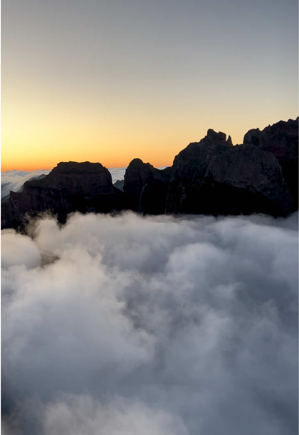 At the serene heights of Madeira, amidst the gentle whispers of the setting sun and the tranquil drift of clouds, lies a sanctuary of peace.  Here, the chaos of daily life fades away, leaving only the present moment to cherish.  In this tranquil setting, I discover harmony amidst turmoil, embrace the mysteries of the unknown, and, above all, find solace within myself. As the last rays of sunlight vanish beyond the horizon, they serve as a poignant reminder that every ending marks the dawn of a new beginning💫  Location:📍Miradouro do Ninho da Manta, Madeira, Portugal 🇵🇹 #Madeira #MadeiraIsland #TravelPortugal #TravelMadeira #SunsetViews #SunsetMadness #BreathtakingView #MountainViews #SummitView #Cloudscapes #NatureEnthusiast #Quiettime #innerpeace💫 #serenitynow #ReflectingOnLife #philosophyoflife #mindfulnessmeditation #SoulSearching #JourneyWithin #FreshStarts 