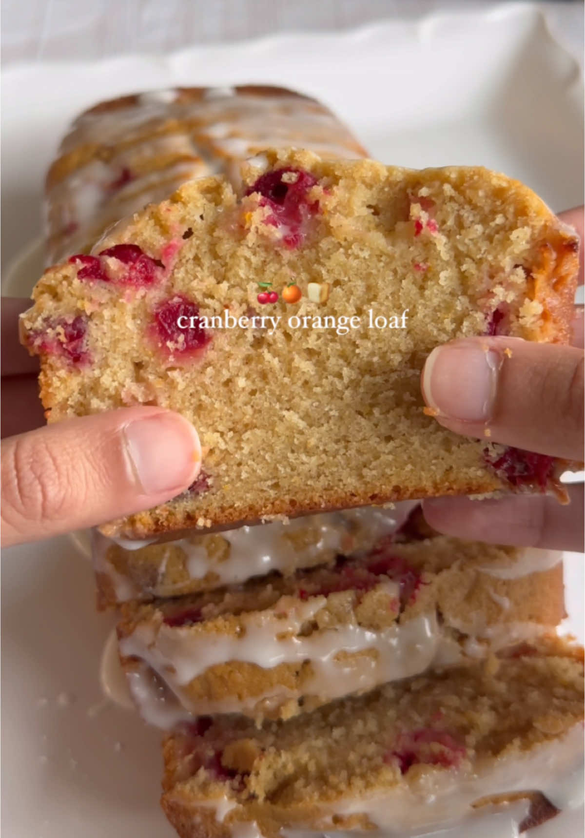 Cranberry orange loaf🍒🍊🍞🥹🎄 Ingredients: - 1 cup granulated sugar - Zest from one orange - 1/2 cup unsalted butter, room temperature - 2 large eggs, room temperature - 2 tablespoons orange juice - 1/2 teaspoon salt - 1 1/2 cups all-purpose flour - 1 tsp cinnamon - Pinch of nutmeg - 1 teaspoon baking powder - 1/2 cup whole milk - 1 cup fresh cranberries, roughly chopped Directions: - Preheat your oven to 350°F and line a loaf pan with parchment paper. - In a medium bowl, sift together the flour, spices, baking powder, and salt. Set aside. - In a small bowl, mix the cranberries with 1 tbsp from the flour mixture until the cranberries are coated. Set aside. - In a large bowl, add the granulated sugar and orange zest. - Use your fingers rub the zest into the sugar. Do this for around two minutes.  - Add the butter then cream together until light and fluffy, about 3 to 5 minutes. - Beat in the eggs and orange juice. Gradually add the dry mixture in. Slowly add in the milk and once the batter comes together, scrape the sides of the bowl. Fold in the cranberries. - Pour the batter into the prepared pan and bake for 55-65 minutes. The top of the loaf will be cracked, raised, golden brown in color, and firm to the touch. A toothpick inserted into the center of the loaf should come out clean once ready. - Let loaf cool, then enjoy! #holidayrecipe #christmasdessert #bakingszn 