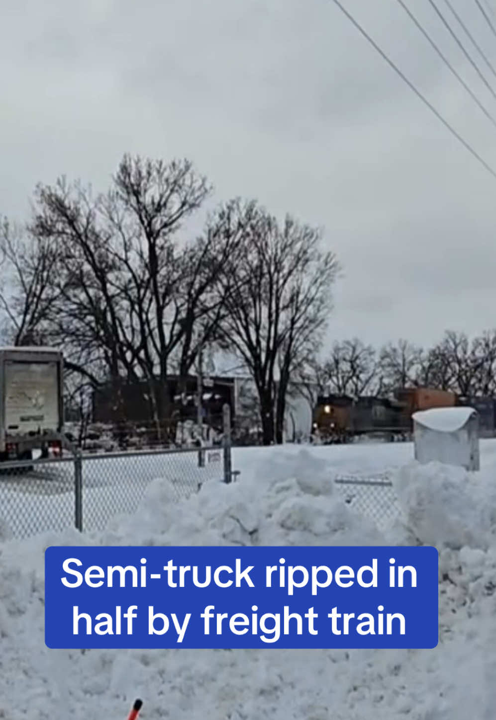 The chilling video shows the moment a train smashed through a semi-truck after it became stuck on the tracks.  Luckily the driver was able to escape moments before the train collided with it and no injuries were reported.  🎥TimWhipple/TMX #snow #storm #truck #train #Usa #weather 