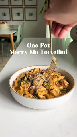 Nearly 10 million people can’t be wrong— my viral Marry Me Tortellini is that good! This is your sign to make it tonight. Not only is it a one pot recipe, easy to make, and absolutely delicious - but it's also perfect for weeknight dinners, potlucks, or any time you wanna wow—trust me, it’ll disappear in seconds ⭐️ 2 tbsp olive oil ⭐️ 6 garlic cloves, minced ⭐️ 1/2 cup sun dried tomatoes in oil ⭐️ 1 tsp Italian seasoning ⭐️ 1 pinch red pepper flakes ⭐️ 2 tbsp flour ⭐️ 2 cups Pacific Vegetable Broth ⭐️ 20 oz cheese tortellini (5 cups ) ⭐️ 1/2 cup cream ⭐️ 2 cups fresh spinach ⭐️ 1 cup parmigiano 1️⃣ Add olive oil, garlic, sun dried tomatoes (and their oil!), Italian seasoning and red pepper flakes to a heavy bottomed pot. 2️⃣ Cook for 3-4 minutes or until garlic is tender and fragrant. 3️⃣ Add flour and cook for 3 minutes to create a roux. 4️⃣ Add in the Pacific Vegetable Broth and bring to a boil. Let the mixture thicken for 3-5 minutes then add the tortellini and a pinch of salt and stir. 5️⃣ Turn the heat off and add in the heavy cream, parmigiano and spinach and stir once more until the spinach is wilted. 6️⃣ Season with salt and pepper to taste Or get the full recipe here - https://grilledcheesesocial.com/2023/11/05/marry-me-tortellini/ #fypシ゚viral #fyp #DinnerIdeas #marryme #marrymechicken #pastatiktok #pastarecipe  