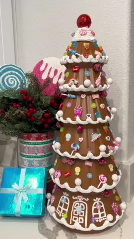 This was so fun to do 🤩 You can shop the supplies I used to make this on my LTK (in bio) 🔗 I used Fast n Final lightweight spackling from Walmart, spray paint in the color warm caramel, also from Walmart, and candy charms from Amazon. The cake piping bag and light up red nose are from Dollar Tree 🌳 Have you found any of the stackable decorations Dollar Tree is offering this year? They have Christmas trees, presents and snowmen! ☃️ #dollartree #dollartreediy #dollartreecrafts #crafts #christmascrafts #DIY #diychristmas #budgetfriendly #gingerbreadtree #dollartreechristmasdiy 