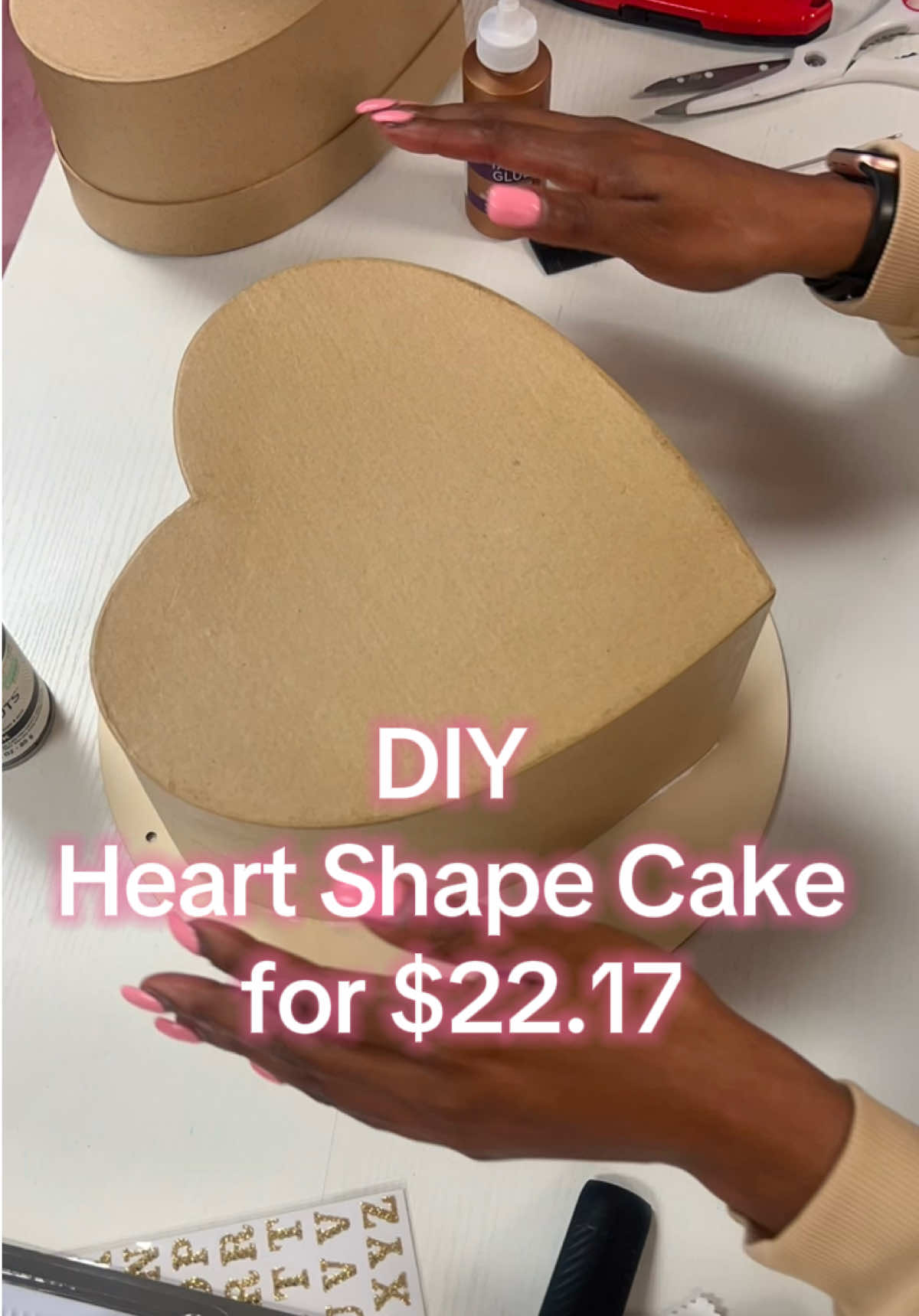 DIY Project! I made this cake using supplies from Dollar Tree & Hobby Lobby & it came out so cute! 😍✨ Dollar Tree: 1.Circle Board 2.Cake Decoration Kit 3.Pillsbury Cream Cheese Frosting 4.Tacky Glue  Hobby Lobby: 1.Paper Mache Heart Shape Box 2.Alphabet Stickers 3.Krylon Glossy Spray Paint Black #FYP #ChelleLaBellePhotography #artsandcrafts #DIY #SagSzn 