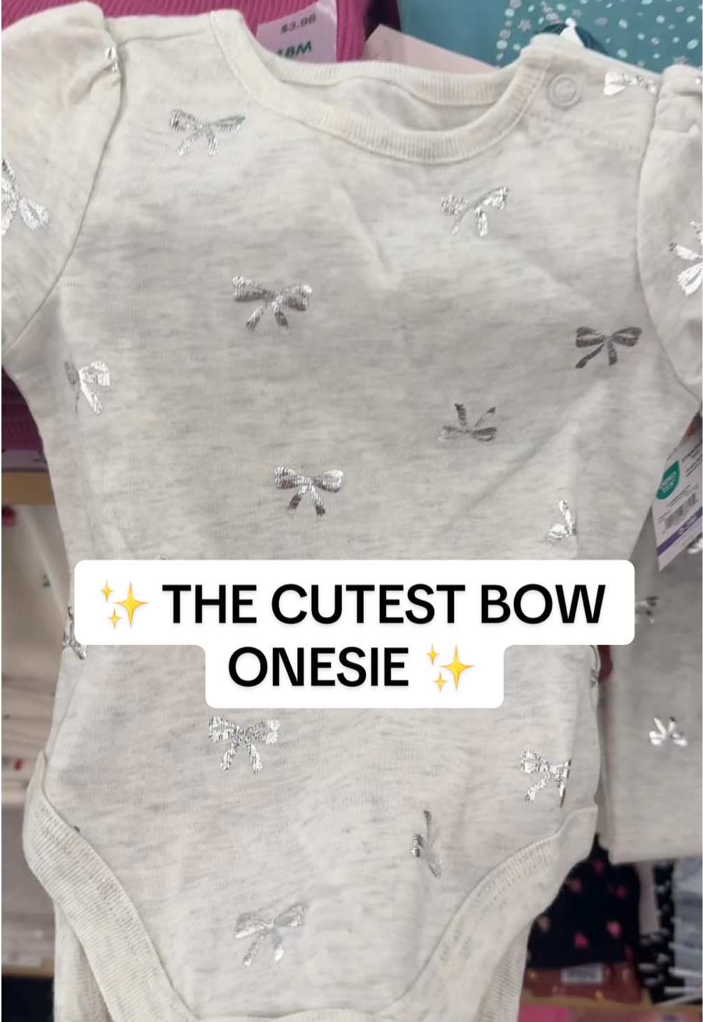 Cutest Bow onesie for less than $5! Linked in the comments. Click comments and look for blue thumbs up 👍🏼 on top #bows #bowseason #walmartfinds #walmartshopping #walmartbabyfinds #holidayfinds #babytok #babyfever #MomsofTikTok 