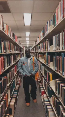 “Reading through life to keep the world going smoothly” #fyp #fashion #ootdinspo #outfitinspo #library #blackman #africanamerican #90svibe #vhsedits 