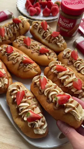 THE BEST BISCOFF DONUTS RECIPE #food #Recipe #fy #fyp #foryoupage #biscoff #donuts #cream  DOUGH 200 ml milk (lukewarm) 7 g instant yeast (1 tablespoon or 1 sachet) 25 g white caster sugar 16 g vanilla sugar (2 sachets) 1 egg (medium) 35 g unsalted butter 450 g flour (all-purpose) 4 g salt (⅔ teaspoon) FILLING 125 g biscoff spread 50 g biscoff cookie crumbs CREAM 250 g mascarpone 40 g powdered sugar 60 g biscoff spread 8 g whipped cream stabilizer (1 sachet) 250 ml heavy cream  GARNISH strawberries biscoff spread Instructions: In a large bowl, combine the lukewarm milk, yeast, white caster sugar, and vanilla sugar. Mix well. Add the beaten egg and mix again. Then add the softened butter, flour, and salt. Knead the dough for 10–12 minutes until smooth and elastic. Cover the bowl and let the dough rise in a warm spot for 1 hour, or until it doubles in size. Deflate the dough and divide it into 11 equal pieces, each about 68 grams. Shape into balls. Roll each ball into a flat, round sheet using a rolling pin. Spread a thin layer of Biscoff spread over each sheet and sprinkle some Biscoff cookie crumbs on top. Fold the top edge of the dough slightly downward and press gently. Roll the dough tightly into a firm log. Pinch the seam to seal, ensuring there are no gaps. Lightly roll the log to make it slightly longer and flatter. Place the rolled dough logs on a baking tray lined with parchment paper. Use a knife to make a slit along the length of each log. Let them rise for 30 minutes, or until doubled in size. Heat a layer of sunflower oil in a frying pan over medium heat (175°C/350°F). Fry the donuts on both sides until golden brown and let them drain on paper towels. ________________________________________ For the cream: In a large bowl, combine mascarpone, powdered sugar, Biscoff spread, and the whipped cream stabilizer. Mix for about 1 minute. Gradually add the heavy cream while continuing to mix until the cream is firm and airy. Transfer the cream to a piping bag fitted with a nozzle. ________________________________________ Assembly: Slice each donut in the middle and fill the center with a little cream. Pipe a long dollop of cream on top of the Biscoff donuts. Garnish with an extra drizzle of Biscoff spread and, if desired, fresh strawberries.