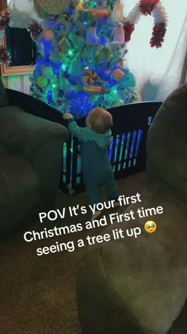 Id say he LOVES it #christmas #christmastree #firstchristmas #baby #tree #lights #candyland #foryo 