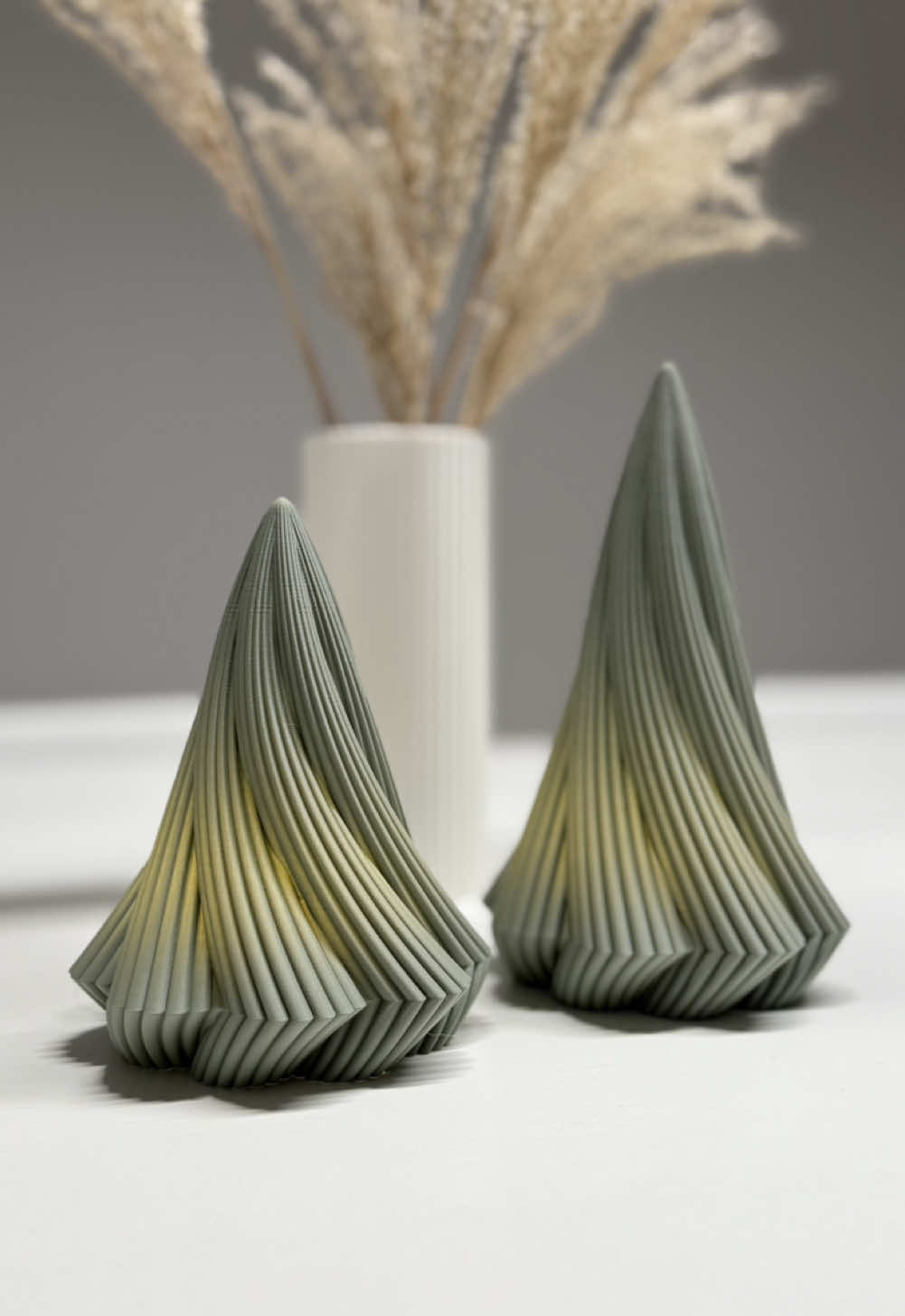 Modern 3D-printed Christmas tree decoration. Printed in @Polymaker 3D filaments Polyterra PLA muted green. Fits @BambulabGlobal puck lights and standard electronic tealights. Files available for free on my makerworld page Commercial license available on my patreon (links in bio). #christmas #3dprinter #bambulab #prusa #polymaker #makerworld #decoration #weihnachten #kerst #weihnachtsbaum #weihnachtsmarkt #3dprinten #sabredesign 