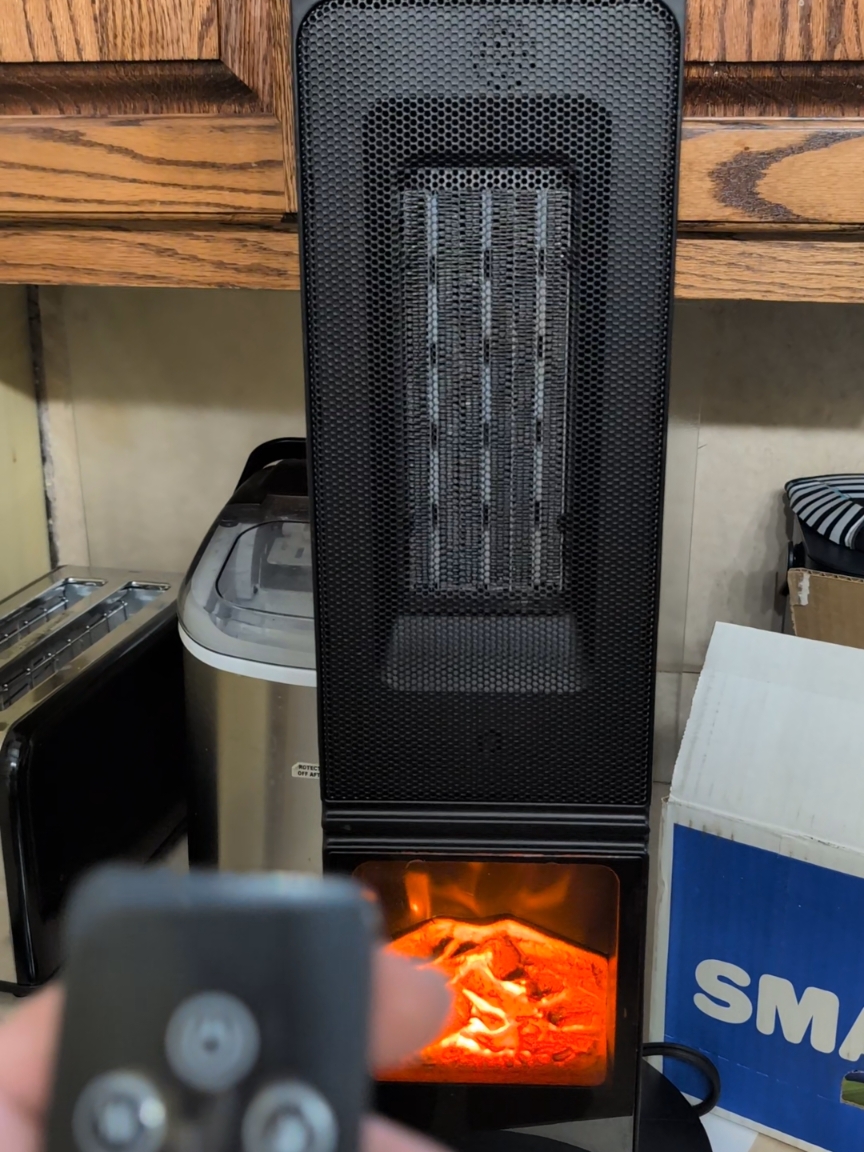 Indoor Space Heater with Fireplace Effect and Remote #fireplace #indoor #heater #heat #staywarm #cozy #fire #christmasgiftideas #Christmasgifts #Christmasgift #fypシ #fyp #Christmas #holiday #holidayhaul #sweetfurniture #tower 