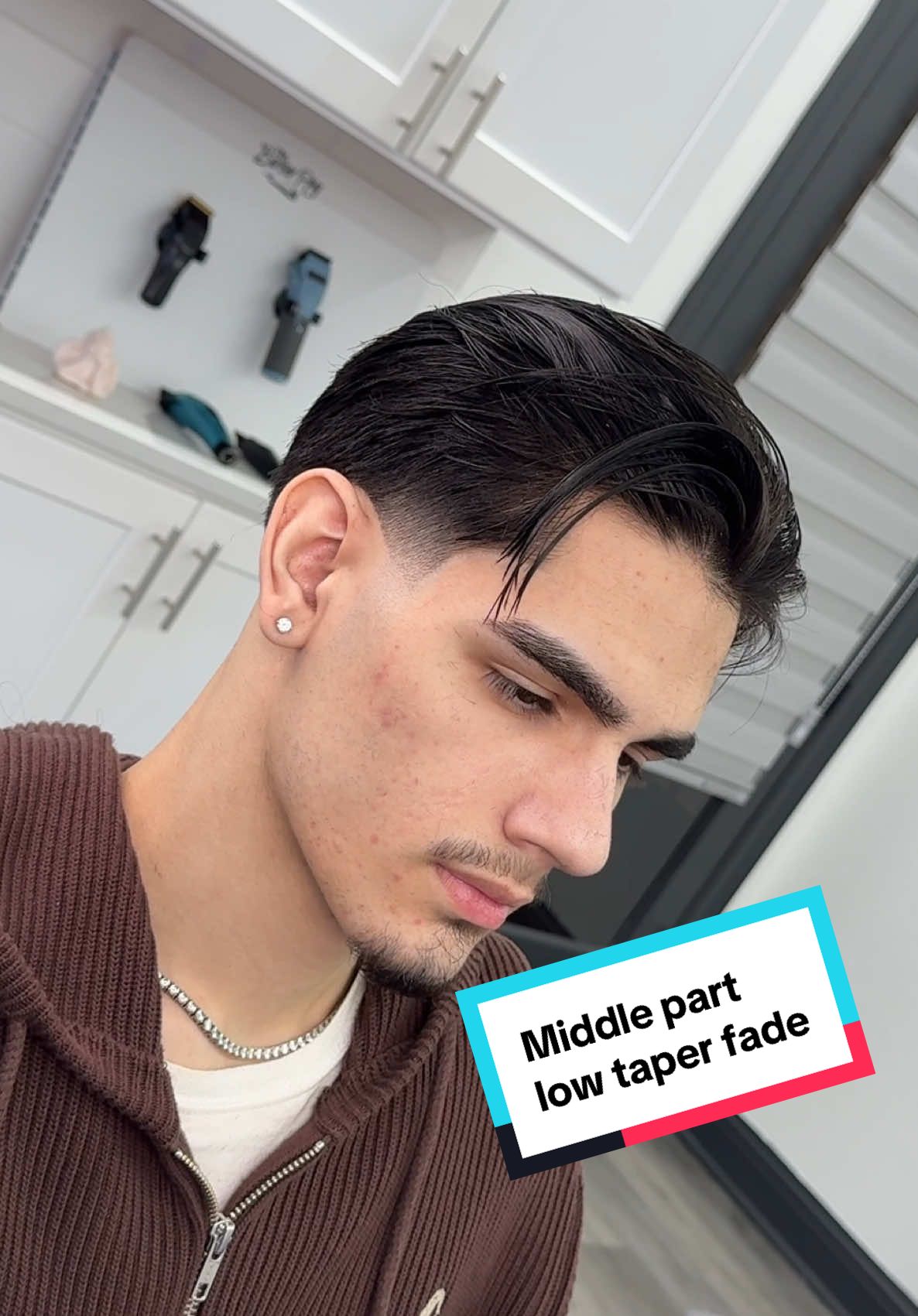 Middle part with low taper fade 💈 crazy hair transformation for my client !! This slick back look is great for men with straight hair hairstyle and can also be rocked with a messy middle part flow ✂️ #dallasbarber #fortworthbarber #texasbarber #menshaircut #barberconsultation 