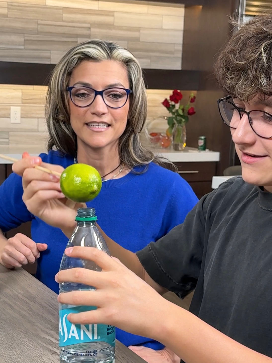 How did the lime get in the bottle 😀 #partytricks #momandson #scienceormagic