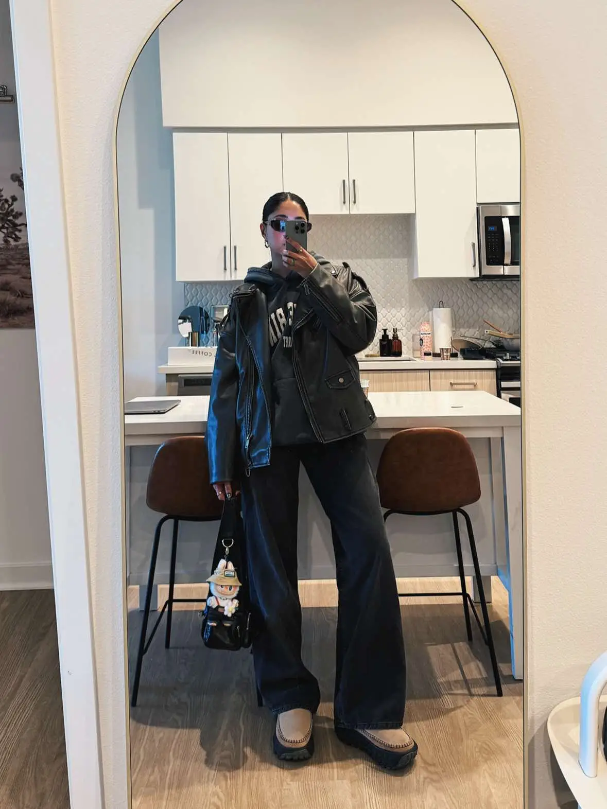 Its finally “freezing” in Cali 😅🥴 Jacket @Lioness  Hoodie @ANINE BING OFFICIAL  Jeans @MOTEL  Shoes @UGG®  #motojacket #outfit #outfitinspo #outfitideas #fashiontiktok 