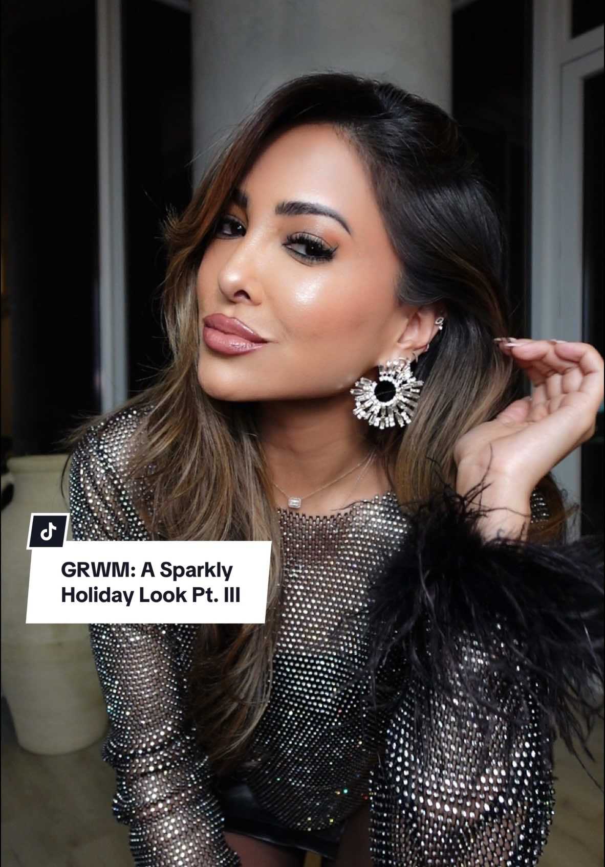 GRWM: A Sparkly Holiday Look Pt. III💫 #fyp #styleinspo  Rate this #OOTD from 1-10 ✨ Today’s Affirmation: “I shine bright always” 🤍 TAG someone who would love this & don’t forget to save the video to refer back to when styling • #outfitinspo #fashion #styletips #outfitideas #grwm #fashionstyle #styling #todaysoutfit #todayslook #fallfashion #styletok #tutorial #foryoupage  Outfit Details: robe — victoriassecret  top — shopakira  skirt — showpo  earrings — ettika  shoes — old perfume — parfumsdemarly  shimmer highlight — fentybeauty  hair — dysonbeauty  powder — hourglasscosmetics  bag — cultgaia