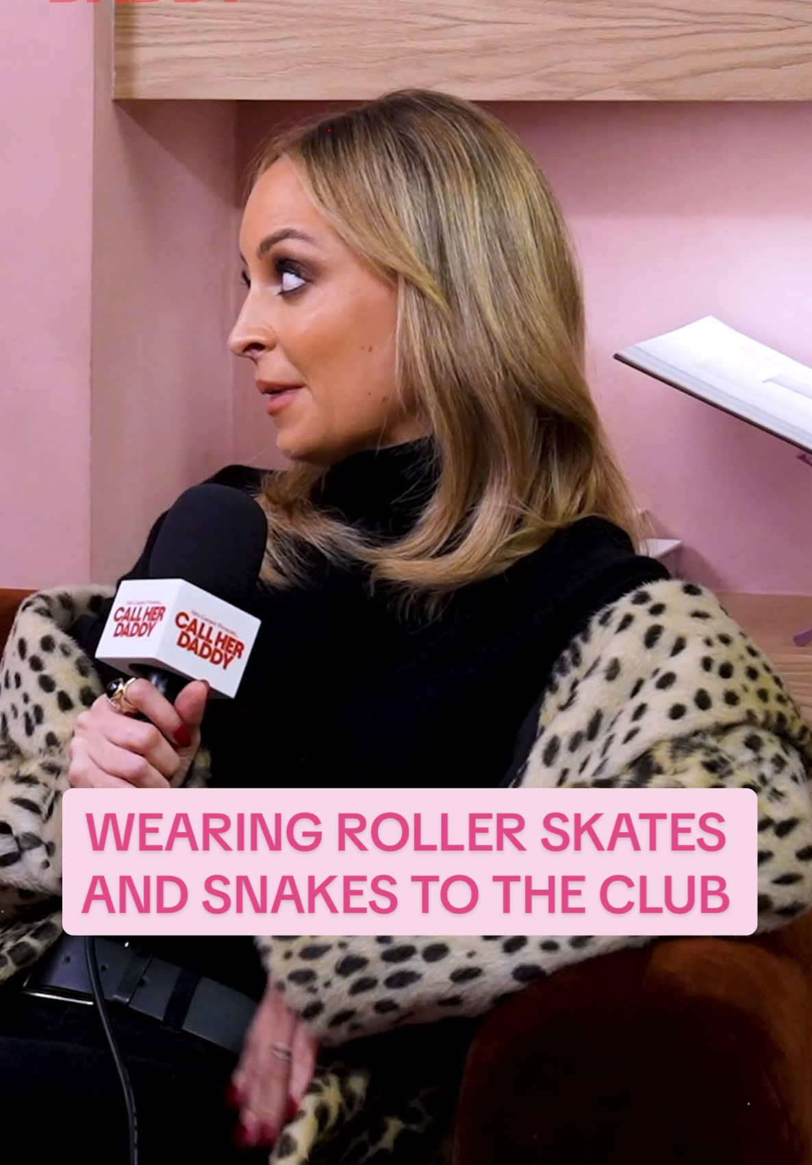 Rollerskates + a live snake = being gorg at the club