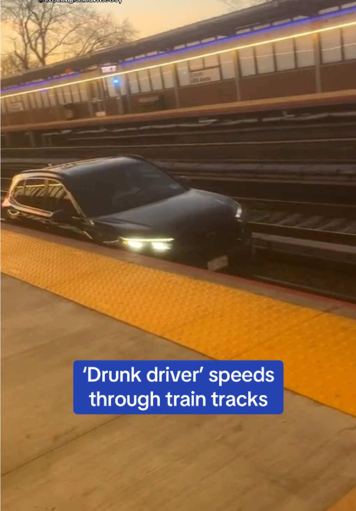 A 40-year-old New York man was arrested after driving his car at high speed along the tracks of the Long Island Railroad on Sunday, where it eventually burst into flames. He was allegedly drunk.  Video by a witness shows the black SUV bumping along the tracks closest to the platform, attempting to avoid stopped trains occupying the other two lanes. Read the full story at DailyMail.com.  🎥 IG/LongIslandWiseGuy #news #driving #newyork #trains