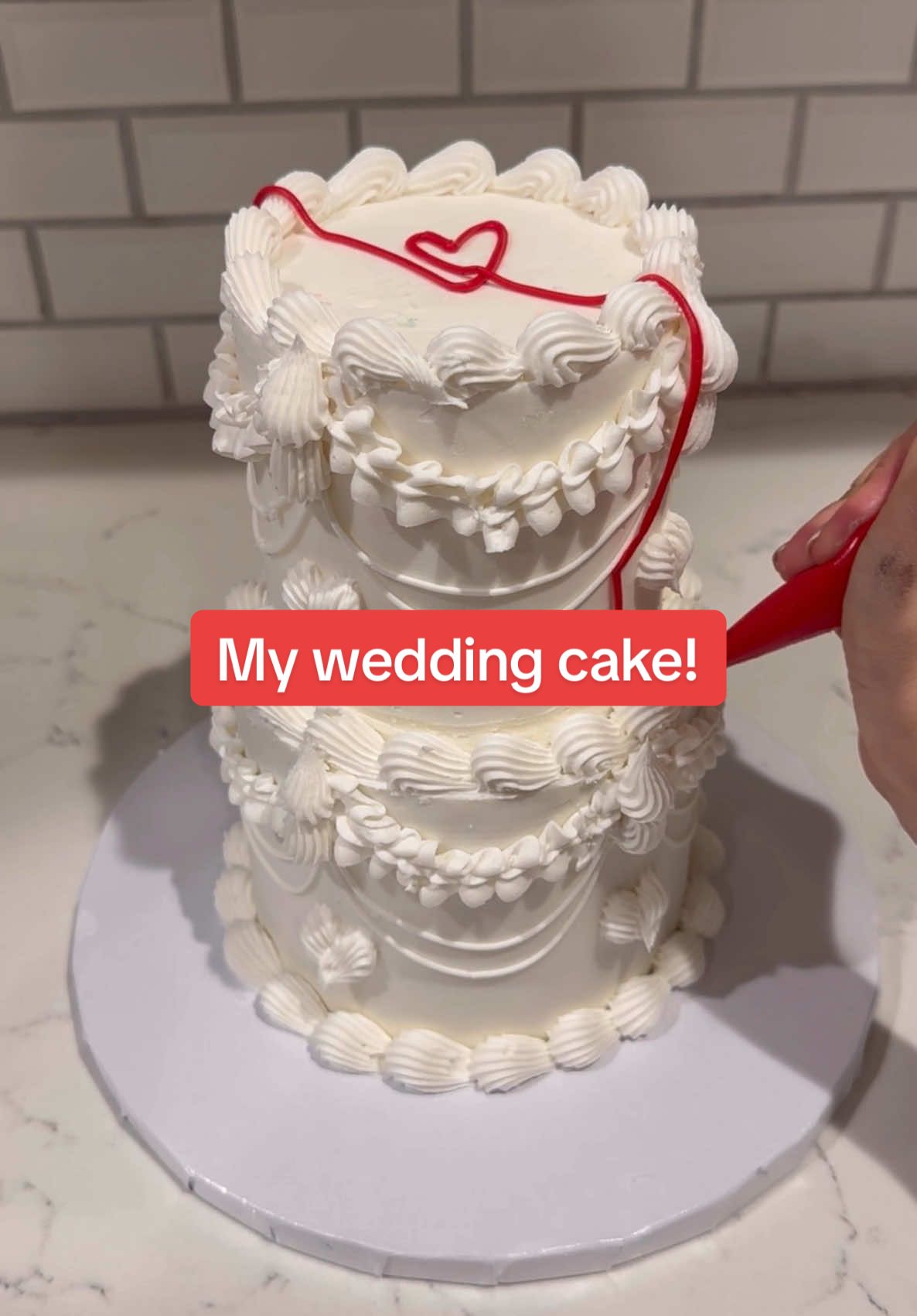 Which one did you like more? #cakesbymarian #cakedecorating #cakevideo #cakeart #caketok #cake #cakes #realisticcake #realorcake #wedding #weddingcake #engaged #viralcake 