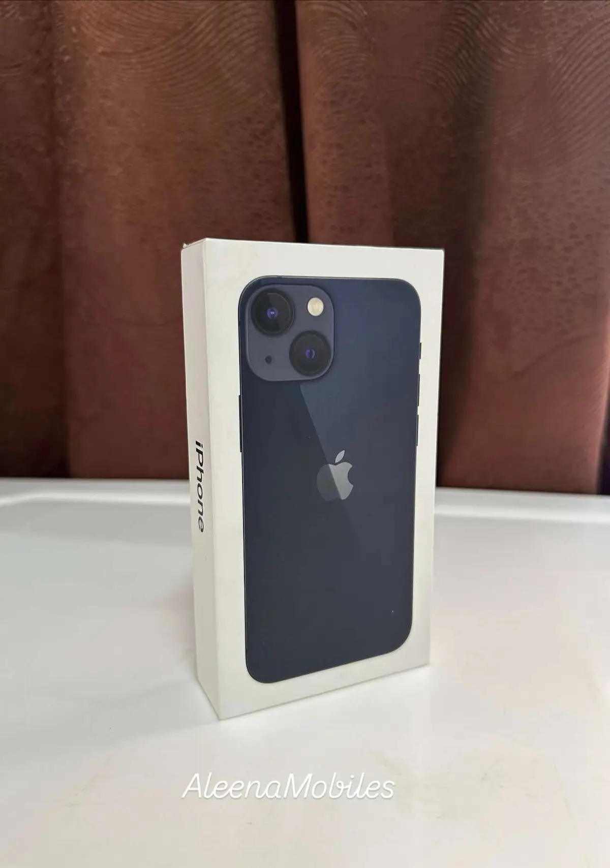 For Sale Promo 👌 ORIGINAL & GENUINE  IPHONE 13 mini 128gb  Midnight colour , BATTERY 77%  Perfect running condition with 2 Silicone Cases  Pre owned  For more info call / Whatsapp on 58968575  Yes we do trade in also 😊 For more info check out Aleena Mobiles facebook page or call directly