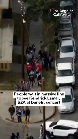 Take a look at the massive line to see Kendrick Lamar and SZA at the Watts Christmas benefit concert in Los Angeles. This is what the wait looked like just minutes before the gates opened for the 11th annual TDE Christmas Concert and Toy Drive at the Nickerson Gardens Housing Projects. Tap the link in our bio to see the charity benefit’s entire star-studded lineup.