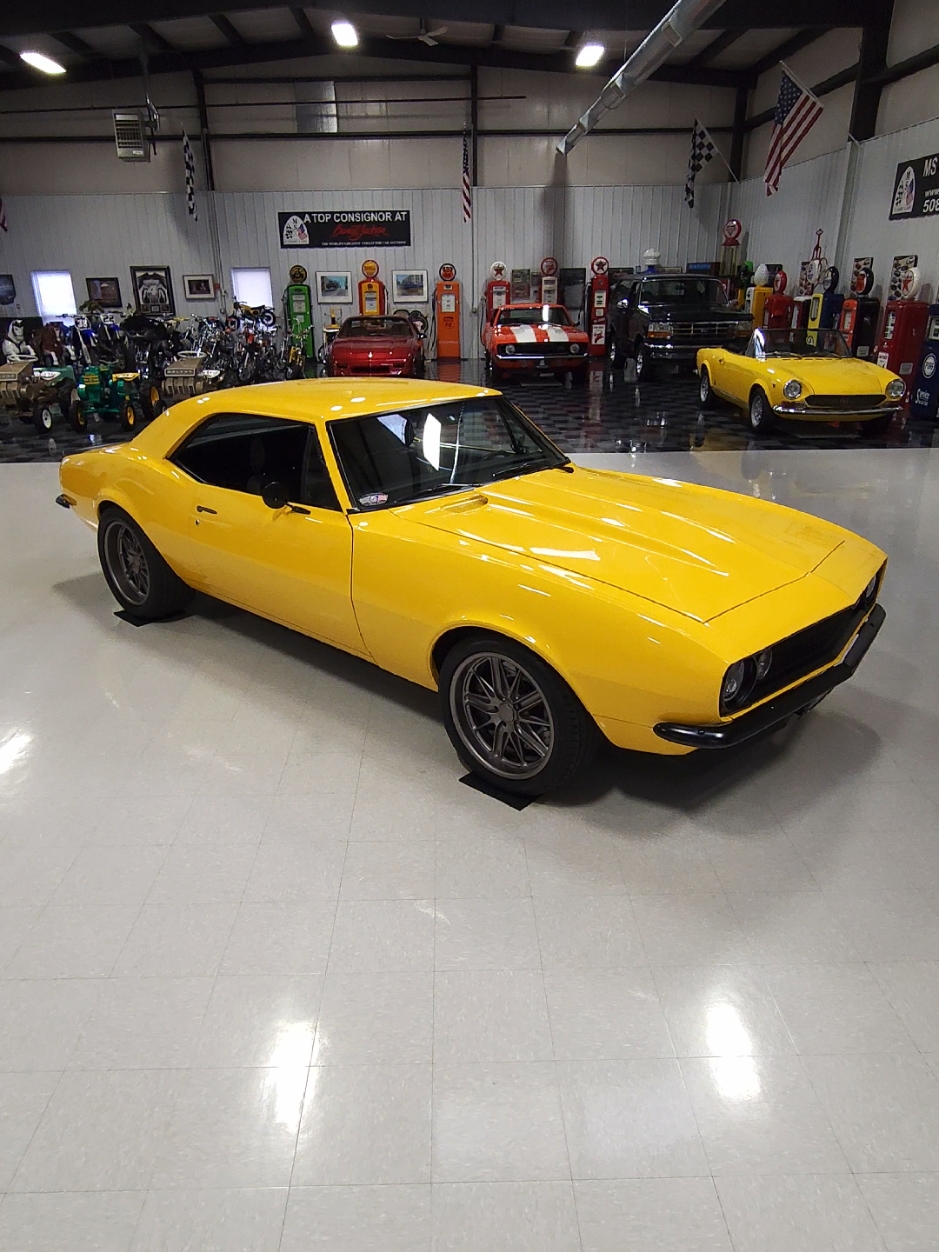 This awesome first generation 1967 Chevrolet Camaro is the ultimate G-machine with a Supercharged LS3 and Art Morrison full chassis. Yes, this Camaro rides on an Art Morrison full chassis! As the original VIN number indicates this car was built in Los Angles, California as a 1967 Chevrolet Camaro Coupe with an 8-cylinder engine. WD-40 teamed up with SEMA Cares to build a very special 1967 Camaro which was also designed to pay tribute to both the SEMA Show and the Camaro's 50th Anniversary. This special 1967 Camaro was designed by Neil Tjin and built in partnership with Tjin and instructors from Universal Technical Institute. The installation of all its mechanical components was documented on PowerNation TV and was completed with help from a host of aftermarket companies including Eckler's, Budnik Wheels, Axalta, Eibach, Falken Tires, Baer Brake Systems, LR Auto Body and Optima Batteries. The car went on to debut at the SEMA Show where it was a big attraction. The car was sold a few months later and became part of a private collection. It was offered for sale with 975 test miles in August of 2024 and MS CLASSIC CARS jumped on the opportunity to purchase it. MS CLASSIC CARS gave this car a facelift during the service and detail process. December of 2024 is the first time it's been listed for sale since completion. Read more on our website. #Chevy #camaro #Chevrolet #classiccar #musclecar #hotrod #restomod #supercharged 