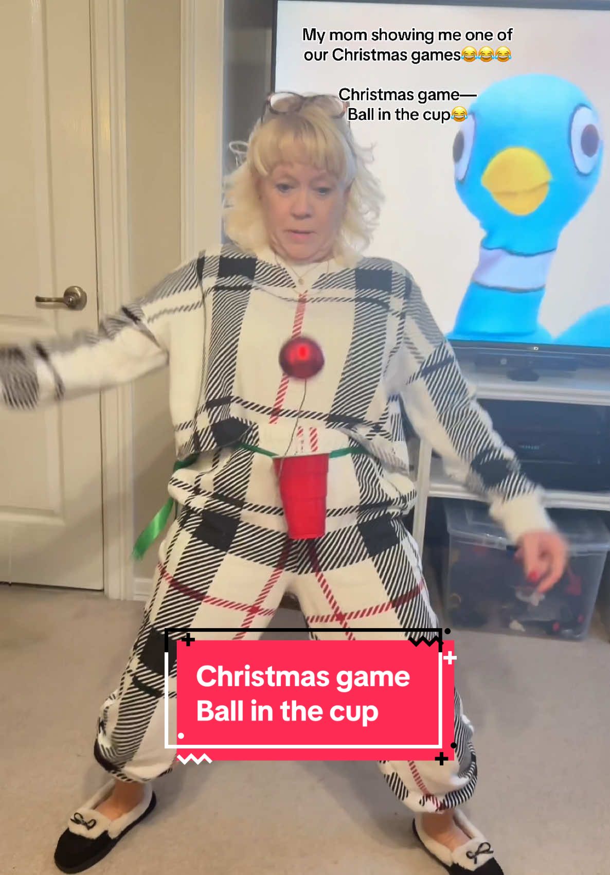 My mom showing me one of our Christmas games😂😂😂😂 Christmas game is called Ball in the cup 😂😂😂😂 #christmasgames #game #christmas #christmasfun #christmastime #ballinthecup #familygames #fun #viraltiktok #fyp #mimi #grandma 