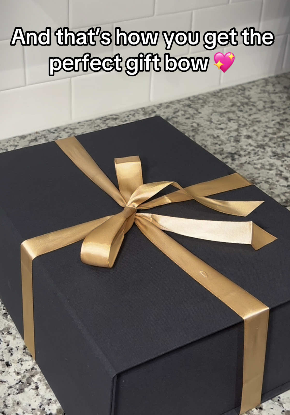 How to tie a ribbon bow around your gift box  🎀✨  #giftwrapping #howtotiearibbon #giftwrappingideas #giftwrappingtutorial #christmasgift #perfectbow 