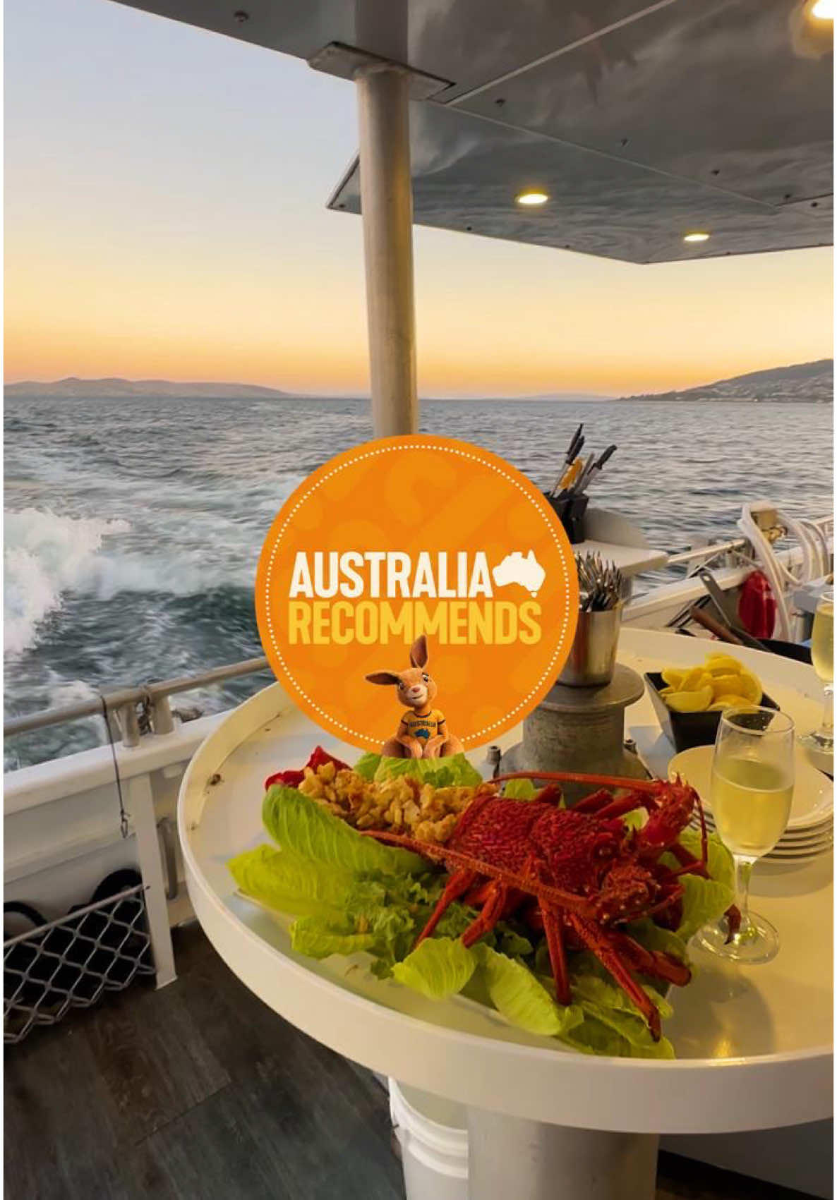 ⭐ Voted by Aussies: Hobart seafood cruise - The best way to get produce straight from the source ⭐  There’s no denying that we do seafood very well in Australia, and the locals reckon that it doesn’t get much better than sampling it straight from the source on a seafood cruise through the pristine waters of Hobart in @Discover Tasmania.  Say g’day to Shane and the crew at IG/tasmanianwildseafoodadventures, who’ll welcome you on board with a smile and a tale or two about why the seafood is so seriously good from around these parts. Witness sea urchins and periwinkles be plucked from the water and cooked before your eyes, before indulging in local oysters, abalone, rock lobster, salmon and of course, a glass of local bubbles. A delight for all the senses, your taste buds will thank you for this one.  📍: #TasmanianWildSeafoodAdventures, Hobart, Tasmania  #SeeAustralia #ComeAndSayGday  ID: Video opens with an aerial of a boat in blue water with the words “Voted by Aussies: The best way to get produce straight from the source” and “Hobart Seafood Cruise” followed by a montage of scenes showing people diving for fresh seafood and dining on a boat during sunset.