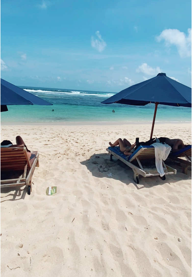 Sunbathing On The Beach 🏖️🏝️#bali #balinese #explorebali #liburanbali #holidaybali #melastibeach #kuta #beachvibes #beach 