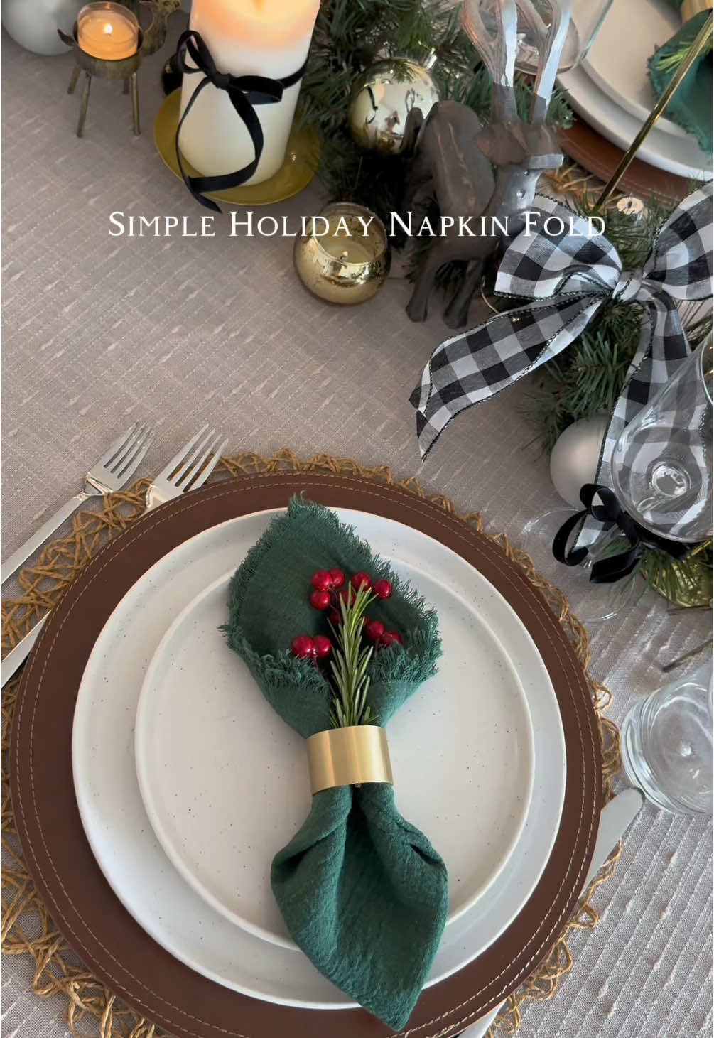 Try this simple napkin fold for your Christmas table! 🎅✨ The napkins, rings, and berries I used are linked in my bio under ‘holiday napkin fold.’  . . . #holidaynapkinfold #christmas #christmasnapkinfold #napkinfolding #napkinfoldingtutorial #napkinfoldingidea #napkinfold #napkin #christmasnapkinfolding #christmasnapkins #christmastablescape #christmastabledecor #christmastable @Amazon 