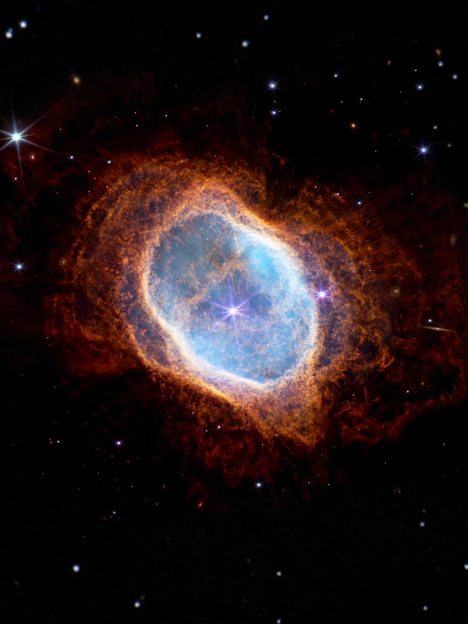 Zoom into the Southern Ring Nebula 💫 The bright star at the centre of NGC 3132, while prominent when viewed by the NASA/ESA/CSA James Webb Telescope in near-infrared light, plays a supporting role in sculpting the surrounding nebula. A second star, barely visible at lower left along one of the bright star’s diffraction spikes, is the nebula’s source. It has ejected at least eight layers of gas and dust over thousands of years. #Space #JWST #ZoomIn