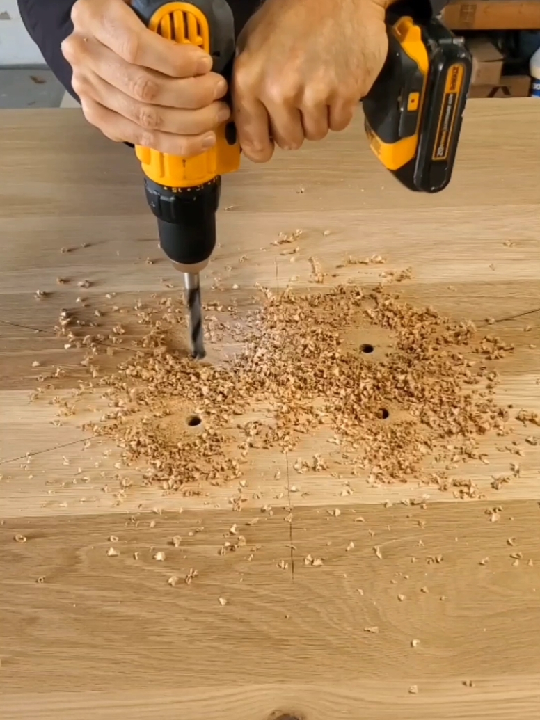 Drilling holes in a brand new white oak table top. #woodworking #woodwork #tabletop 