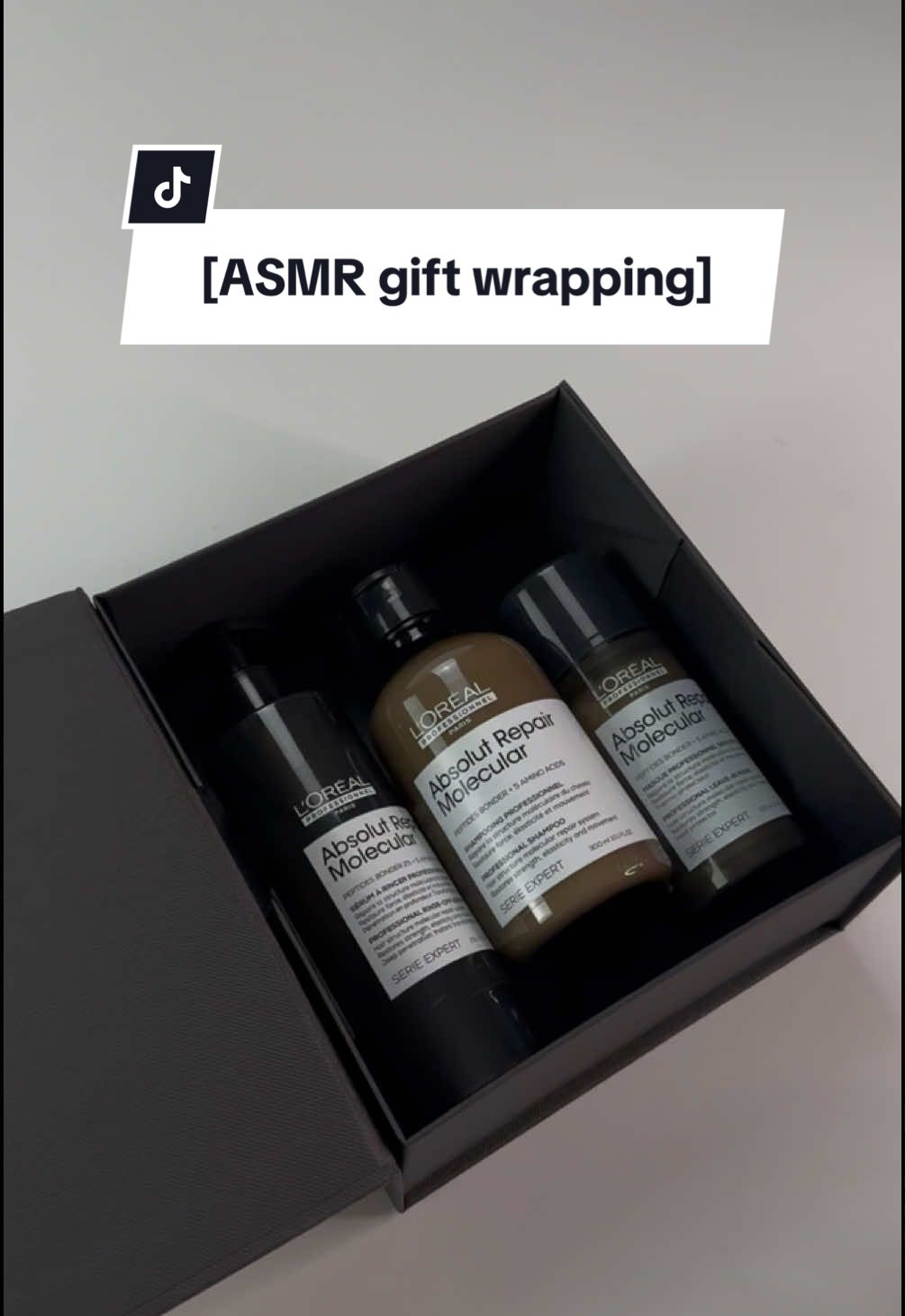 Struggling to find the perfect gift? ✨ Give the gift of healthy, repaired hair with #AbsolutRepairMolecular!  Restore its strength, texture, and dynamic movement at a molecular level.* 🧬   *Instrumental test on the fiber macromolecular structure after application of Absolut Repair Molecular shampoo + rinse-off serum + leave-in mask. . #giftwrapping #haircareroutine  #giftwrappingideas #asmrwrapping #asmrsound 