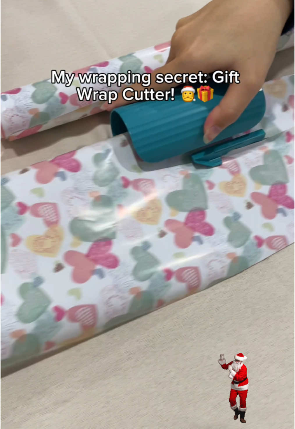 This paper cutter is my name favorite.🎁👍🎅 #gadget #giftwrapping #christmas #deal #giftwrappinghacks #satisfying #fyp #christmas #gifts #christmaswrapping  #WrappingPaper  #tiktokshopblackfriday #tiktokshopcybermonday 🎅 #🎄 #🎁