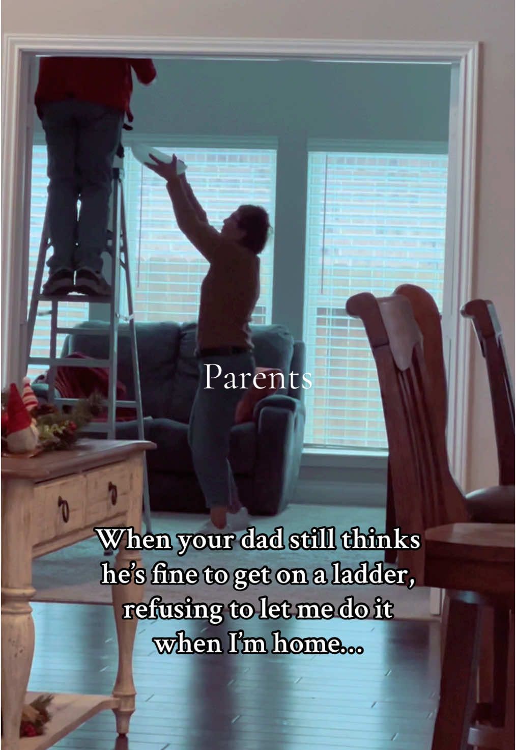 At what age will a grown up Dad let his 35yr old daughter help?! Asking for myself. Because he’s on a damn ladder every time I’m here and won’t let me do it! #aging #parents #homefortheholidays 