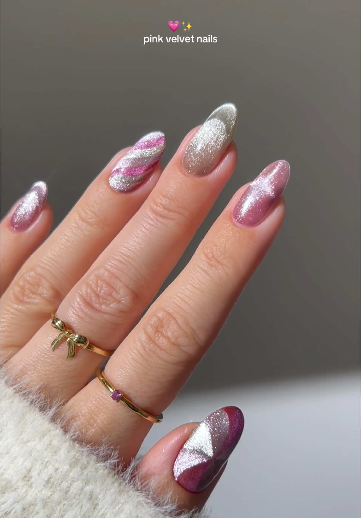 💗✨ soft as snow, sweet as candy dreams 🍬 these pink velvet @Bio Seaweed Gel nails are perfect for the holidays! •ad using new cat eye collection colors:  🎀 dragonheart 💖 a fabled tale ✨ spellbound use code AISTE40 for 40% off from now until Dec 31, 2025, excluding clearance _____ #bsgdragonheart #bsgfabledtale #bsgspellbound #bioseaweedgel #pinknails #glitternails #holidaynails #christmasnails #nails #nailinspo #nailtutorials #diynails #winternails #nailart #cateyenails  almond nails, gold nails sparkly velvet nails