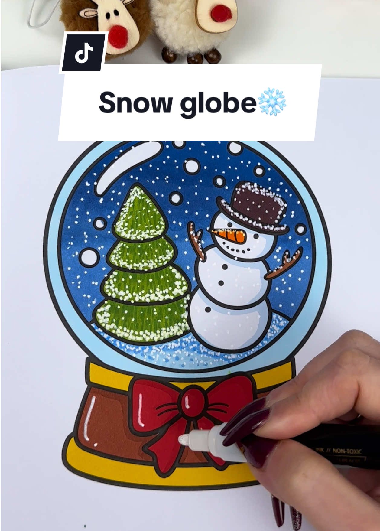 Color with me ❄️ snow globe with little snowman ☃️ and little Christmas tree 🎄 This page is part of my 50 pages ‘Cozy Xmas’ coloring book ✨ Added some snow effect ❄️ #christmascoloring #christmascoloringbook #coloringpages #coloringcommunity #colortiktok #coloringwithmarkers #relaxingcoloring #coloringwithsilvia #cozycoloring #coloringtok 