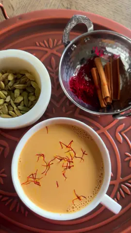 Karak chai, A delicious rich and creamy spiced south Asian tea, popular and loved in the Middle East as well! I always have more than one cup ☕️ Recipe is written down below ⬇️  -1 black tea bag  -7-8 crushed cardamom pods  -5-6 cloves  -1 piece of ginger -1 cinnamon stick -a few saffron strands  -1/2 a cup of water  -1 cup evaporated milk -1 tablespoon sweetened condensed milk(add more if needed and you can change it to any preferred sweetener) Add the cardamom, cloves, ginger, tea bag, cinnamon stick and water to a pot, bring to a boil, add in the evaporated milk and bring to a low simmer for 15 minutes, add the saffron strands and evaporated milk simmer a few more minutes until the tea thickens. Strain into teacups and enjoy! #karakchai#delicious#yummy#thebest#EasyRecipes#Foodie#tea#winter#drink#hot#southasia#karak#chai#recipes#ArabTikTok 