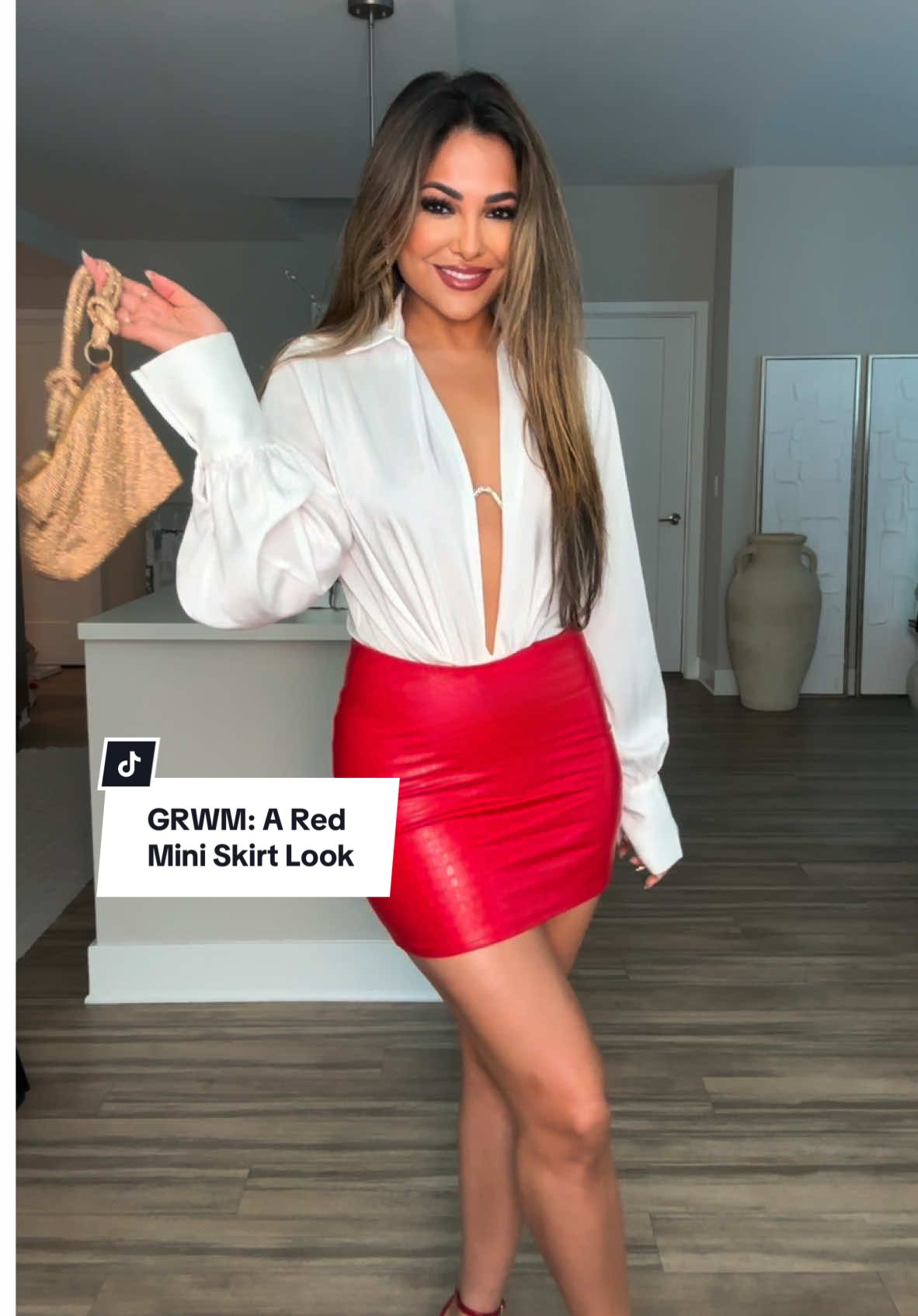 GRWM: A Red Mini Skirt Look💫 #fyp #styleinspo  Here’s a holiday-ish look that would be perfect for a going out look!  This skirt also comes in a midi version, which I loved! They unfortunately didn’t have it in my size to style for this look, so I went with the mini 💫 Rate this #OOTD from 1-10 ✨ Today’s Affirmation: “I trust myself and turn inward”🤍 TAG someone who would love this & don’t forget to save the video to refer back to when styling • #outfitinspo #fashion #styletips #outfitideas #grwm #fashionstyle #styling #todaysoutfit #todayslook #holidaylooks #foryoupage #styleinspo  Outfit Breakdown: You can shop my outfit on my story & in my linktree bio under “shop my instagram feed.” Ill also be adding the links to my “shop links 14” highlight after xo Outfit Details: skirt — @nakedwardrobe  top — @showpo  earrings — @saintliz  shoes — @ninewest  body oil — @soldejaneiro  bag + bra chain — @cultgaia  perfume — @viktorandrolf