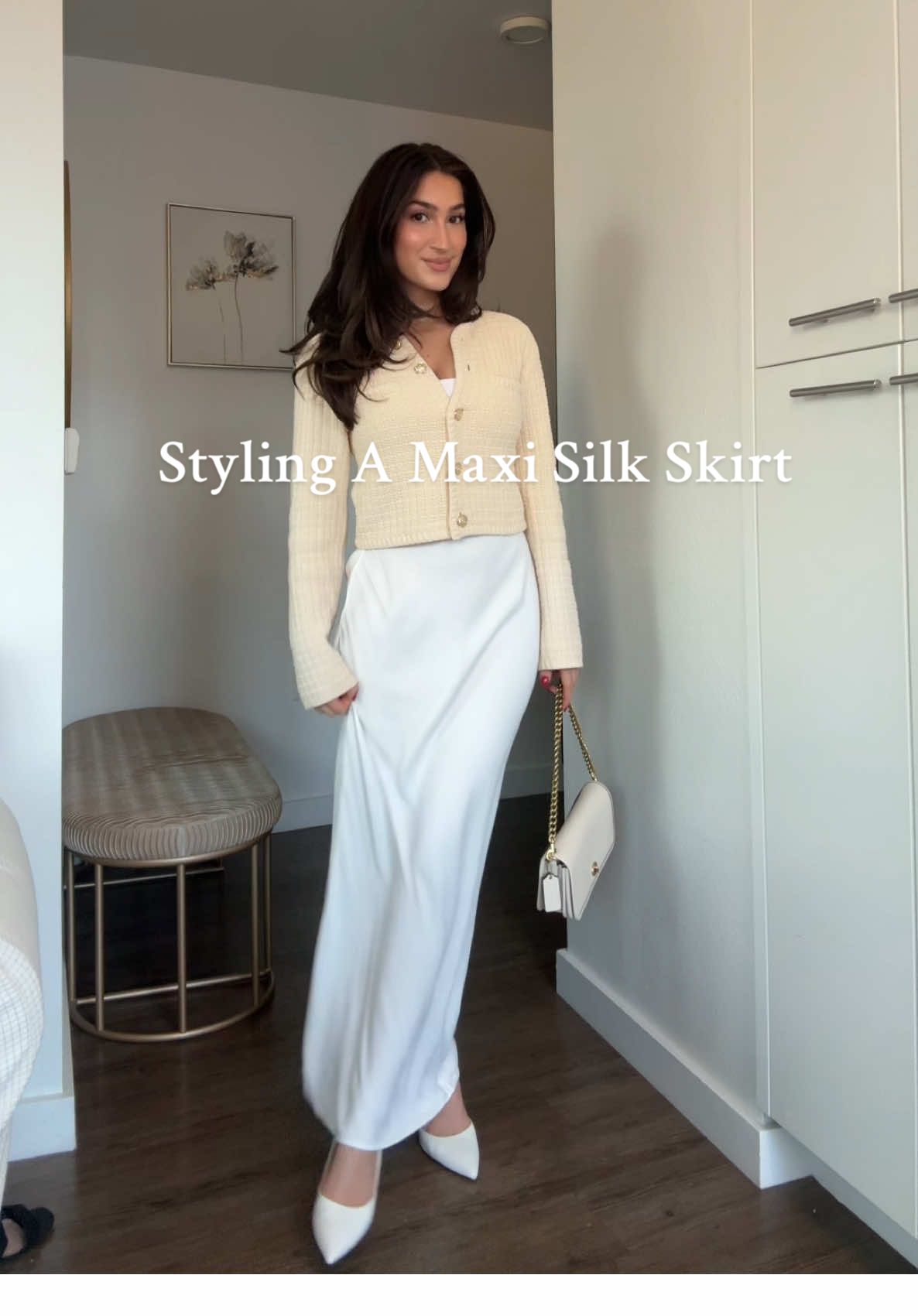 Styling A Maxi Silk Skirt 🤍 Top @H&M   Skirt @Anthropologie  Purse @Coach  Shoes @Amazon Fashion  #fitcheck #outfit #OOTD #outfitideas #outfitinspo #winterfashion #fyp #winteroutfit #styleinspo #winteroutfits #maxiskirt  #fashion #winter #fashiontiktok #oldmoneyoutfits #silkskirt #dinneroutfit 
