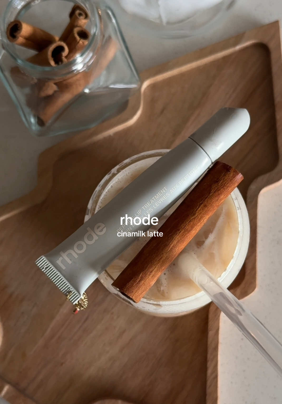 cinamilk latte at home ☕️✨🫶 @rhode skin gives all the winter vibes  -  shot of espresso﻿ - ﻿milk - ﻿1 tbsp  of condensed milk - cinnamon stick - homemade chai @Community Goods  #cinamilklatte #makeup #rhodeskin #haileybieber #icedlatte #icedchai #coffeeathome #coffeetok #cinnamo #latte #aesthetic #communitygoods #CapCut 