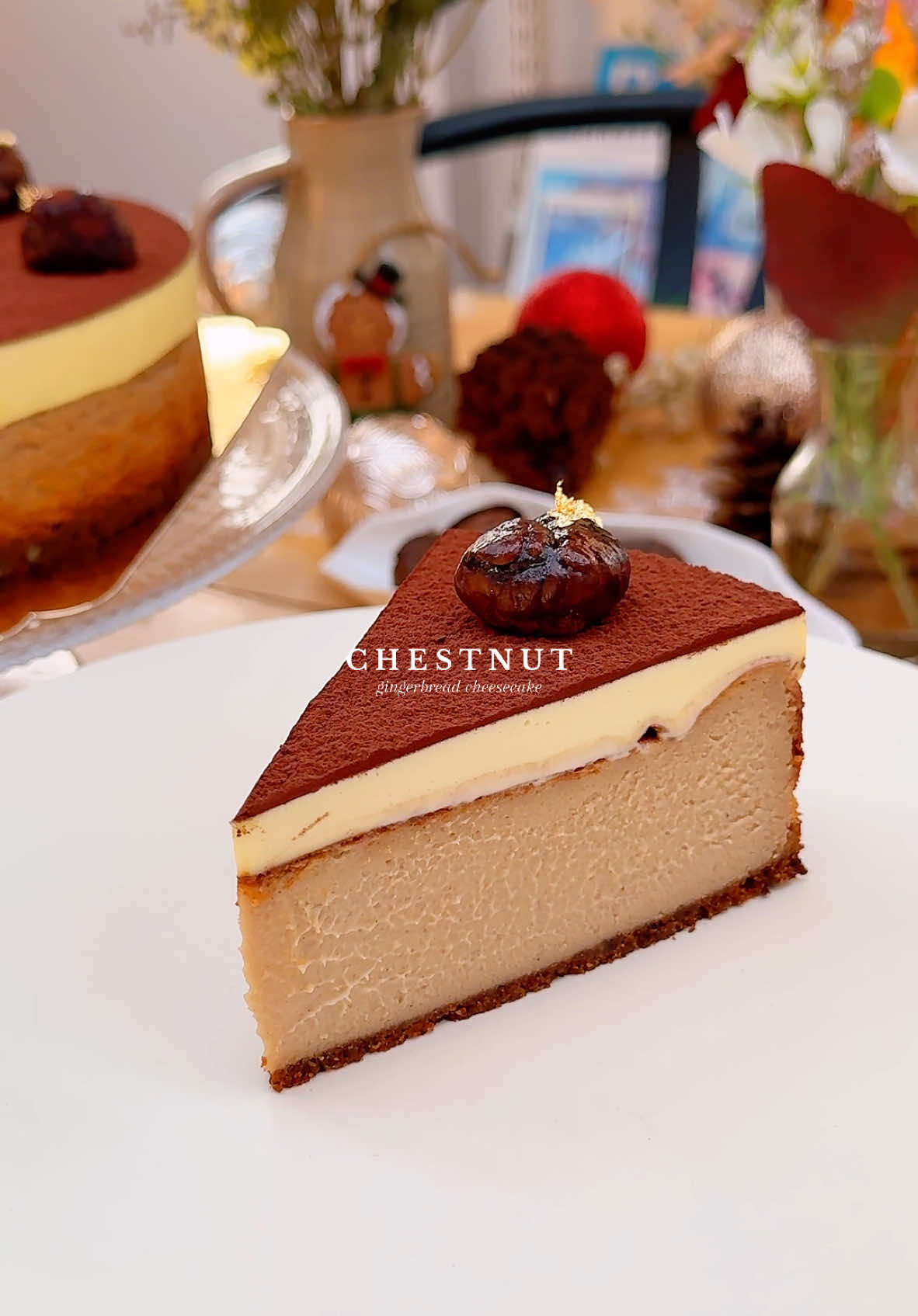 Chestnut gingerbread cheesecake🌰✨ A cozy, creamy roasted chestnut filling paired with a delicious gingerbread cookie crust, lightly sweetened cream and honey glazed chestnuts. The mingling of warm spices, molasses and roasted chestnuts makes it a perfect treat for the holidays🎄❤️ Recipe’s available on my Substack (link in bio)🔗 #chestnut #gingerbread #cheesecake #basquecheesecake #christmasbaking #tiktokfyp 
