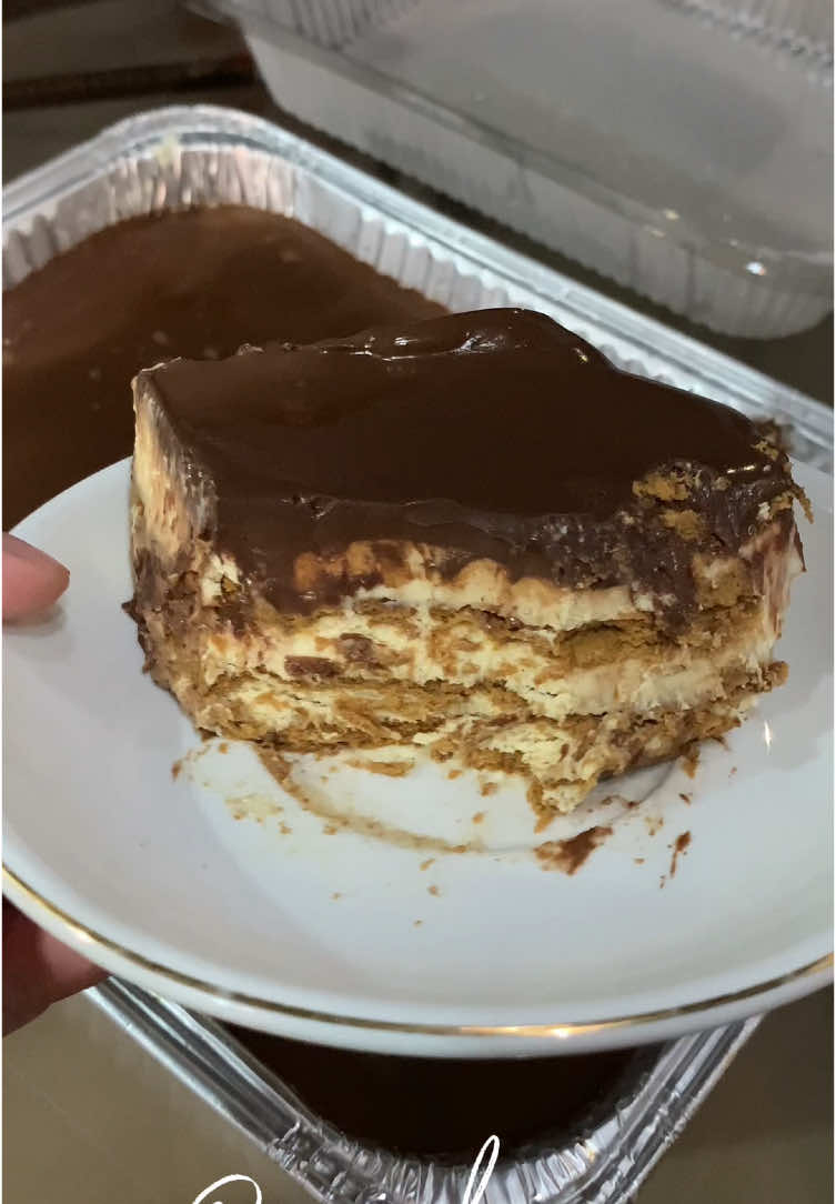 Chocolate Eclair Cake ✨ Ingredients:  4 pcs egg yolks 1/4 cup all purpose flour 1 cup white sugar 1 1/2 cups evaporated milk 1/2 cup butter 2 packs all purpose cream, chilled 1 tsp vanilla 2 tbsp Coffee 2 cups hot water 1 cups all purpose cream 2 cups dark chocolate #eclaircake #grahamcake #desserts #EasyRecipes #DessertRecipes #handaan #dessertideas #graham #homemade #creatorsearchinsights #euniceloisss 