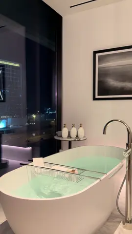 Luxurious Bath with Cityscape Views #LuxuryBathroom #CityViews #DubaiLiving #RelaxationGoals #Viral