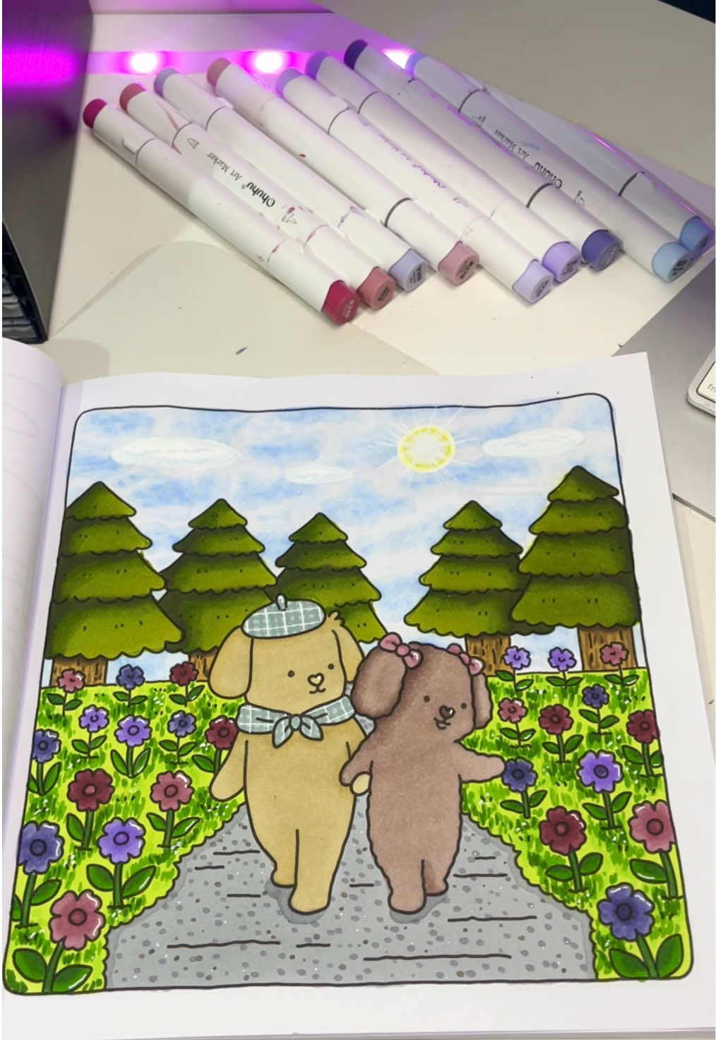 Tbh I do like the sky, trees and grass but think the sun and characters let it down! Or am I just being too hard on myself?!🙈 I dunno sometimes seeing all these beautiful pages people create I’m like mine are just meh 😅 but I did really have fun doing this page (until I got to the characters aha their colours are always off) it made me so happy doing a Christmas page🤣 📖 Sweetheart by @Vivi Tinta Coloring Book  🖍️ @Ohuhuart  #colouringbook #colouringbooks #coloringforadults #colortok #colouring #boldandeasycoloring #vivitintacoloring #ohuhumarkers #adultcoloringbookaddict 