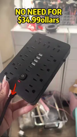 Installing surge protector with tape as a template.