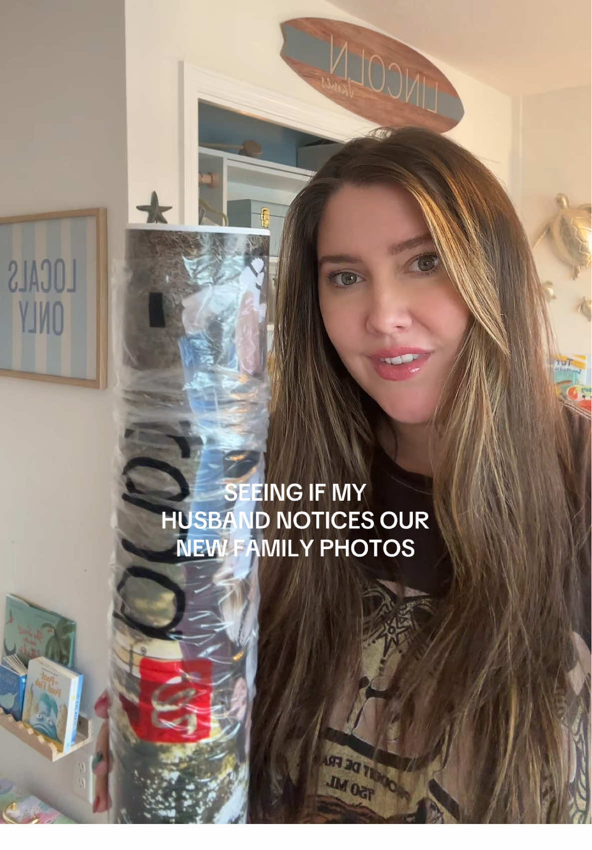 He truly wouldn't have noticed for days if Kens didn't stop laughing! 😅 #husbandprank #familyphotos #FamilyFun #prankingmyhusband #FamilyFun #familythings #husbandwifehumor #framingphotos #homedecor #makingourhouseahome #homedecorating #husbandreacts 