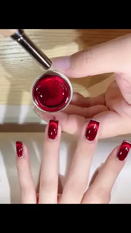 Nails tết mắt mèo đỏ cộng nhũ viền xinh xinh nè😚#nails #nails💅 #nailboxgiare #tiktok #xuhuong #nailsxinh #nailsxinh2024 #nailsphuong #phuongnails 